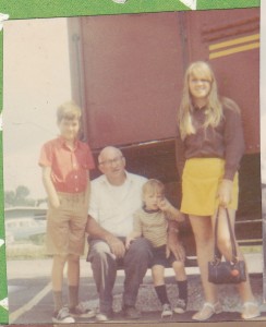 The author with two of her brothers and grandfather on a summer trip